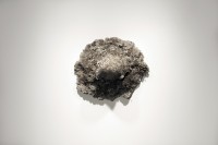 An explosion 1/5,000,000th the power of the first atomic bomb